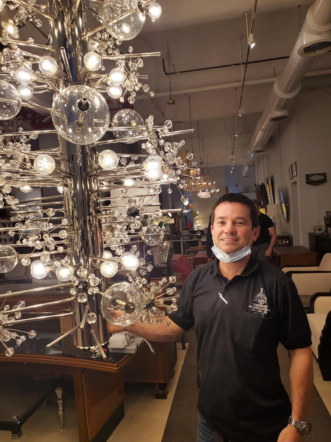 andres londono with light fixture
