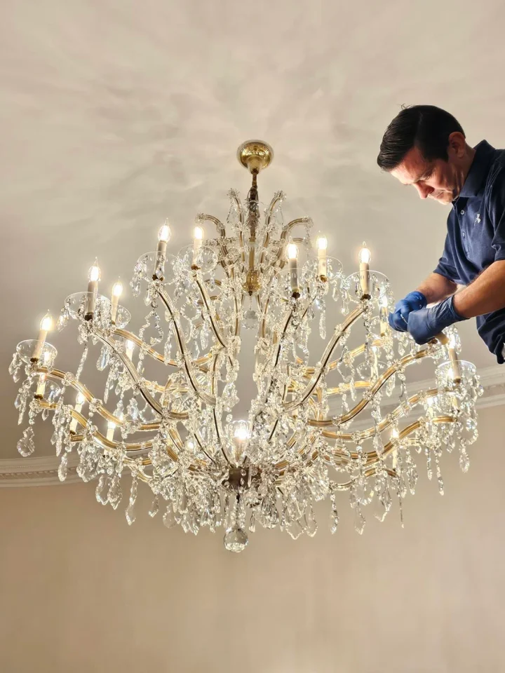 londono brothers working on chandelier install