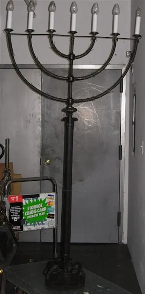 dark antique metal menorah