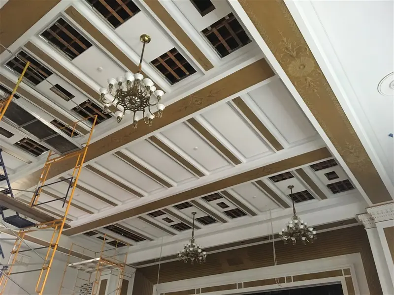 hanging chandelier during restoration