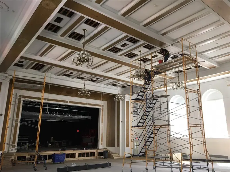 working on chandelier restoration